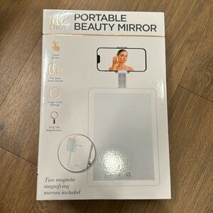 new never been used glo beauty mirror